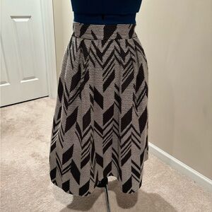 New York & Company Eva Mendez Black and White/Tan pleated skirt.